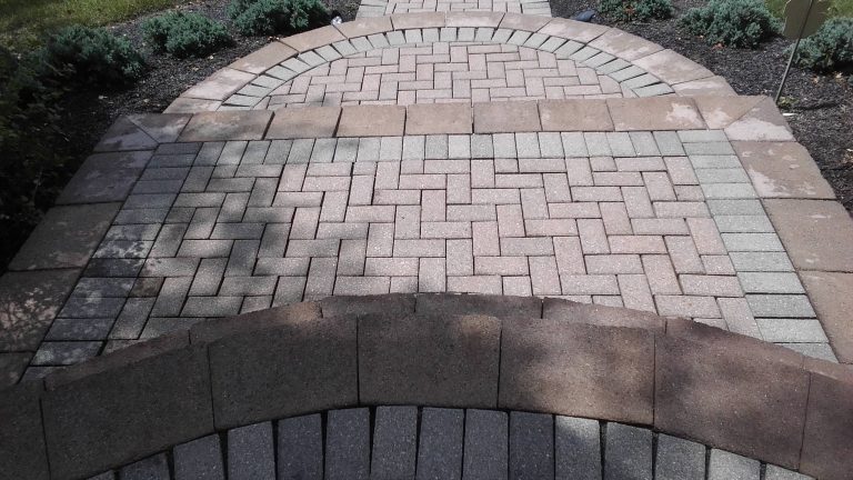Paver walkway and steps featuring a herringbone pattern, recently repaired and cleaned, showcasing the quality of work by Perfect Paver Co. in Blacklick, Ohio.