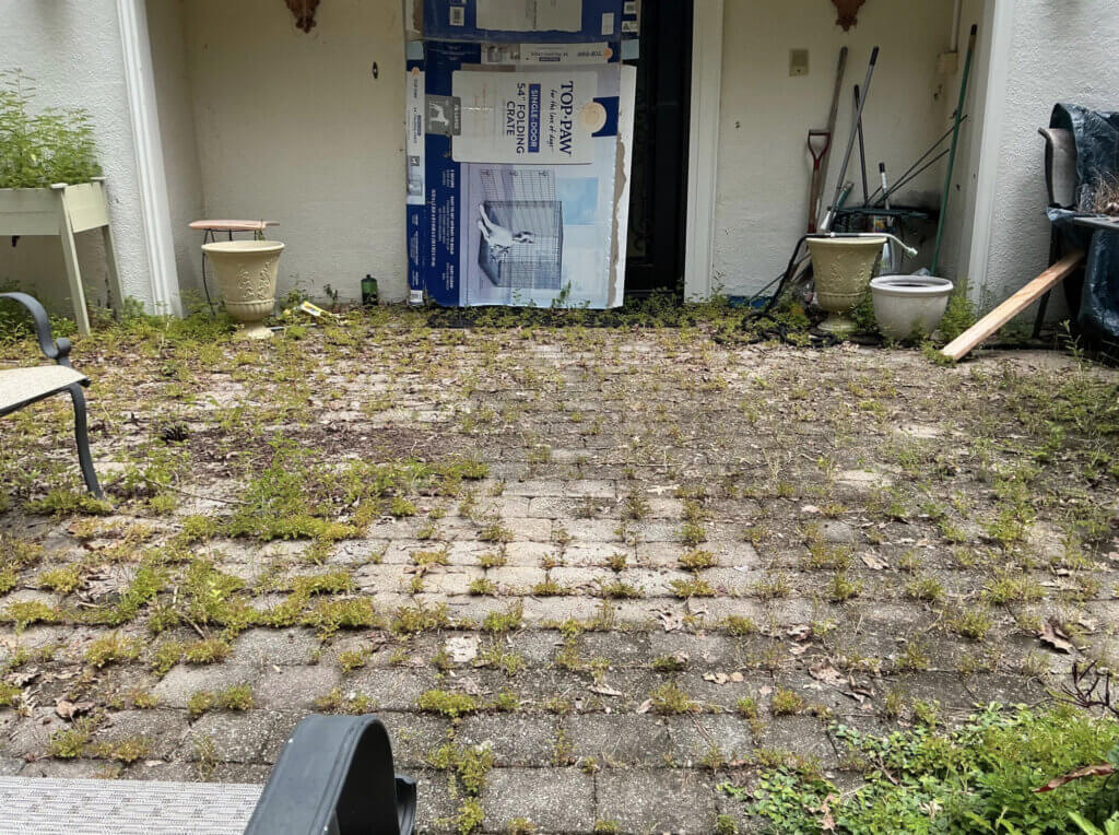 Before picture of a paver porch in Sandy Springs GA before Perfect Paver Co restored it