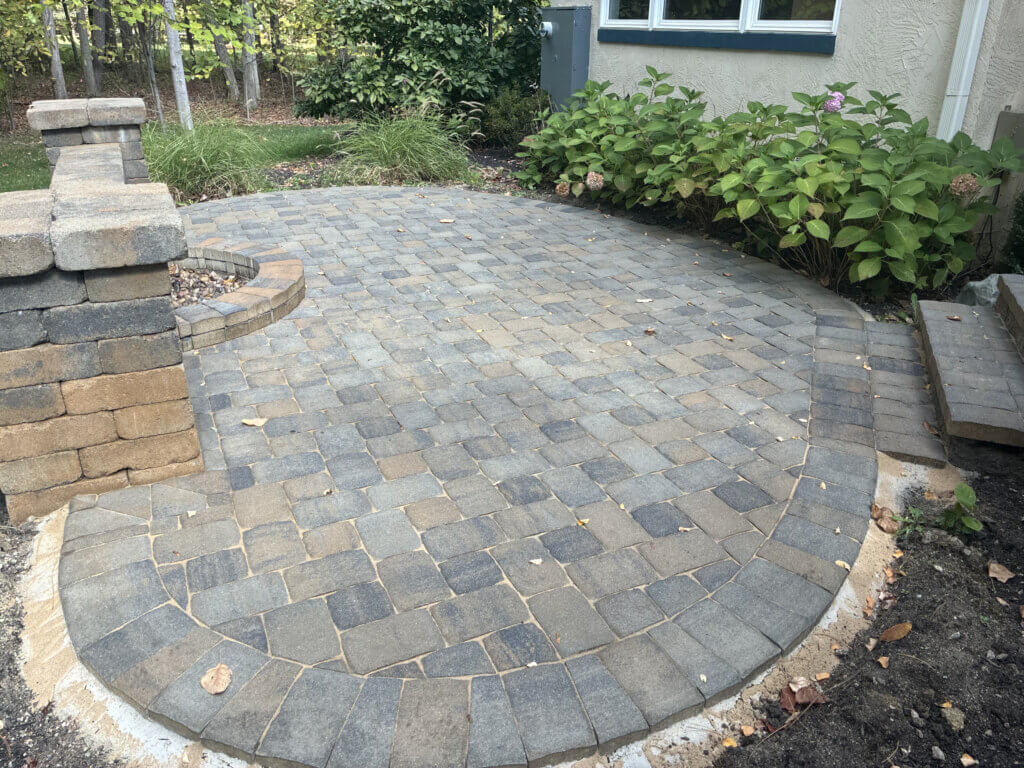 After picture of a patio in Gahanna Ohio that Perfect Paver Co restored by cleaning, sealing and installing new paver edging