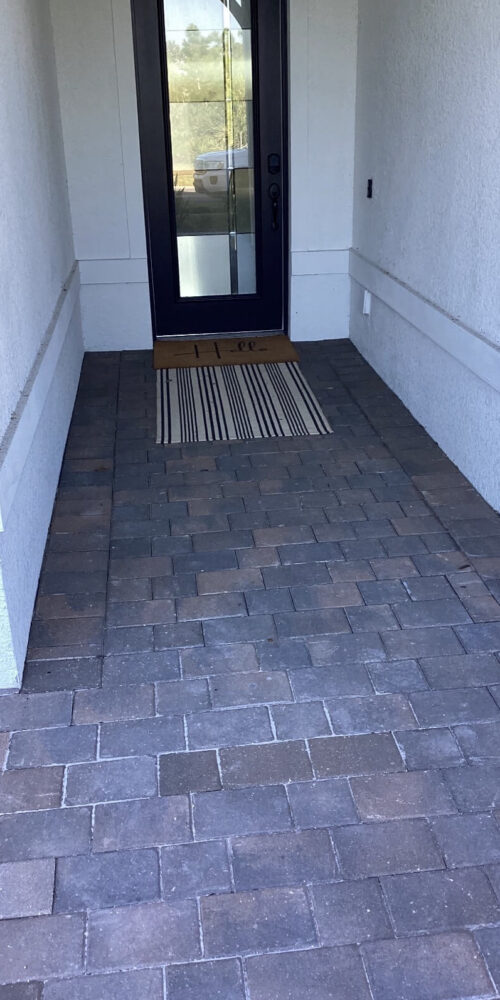 Before pictures of a paver entrance in Englewood Fl before Perfect Paver Co cleaned and sealed it
